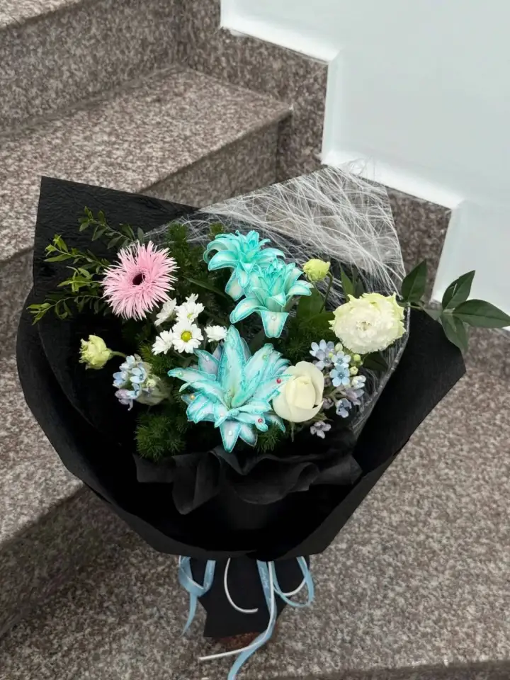 Jade Lily & White Daisy Bouquet on Black Wrap