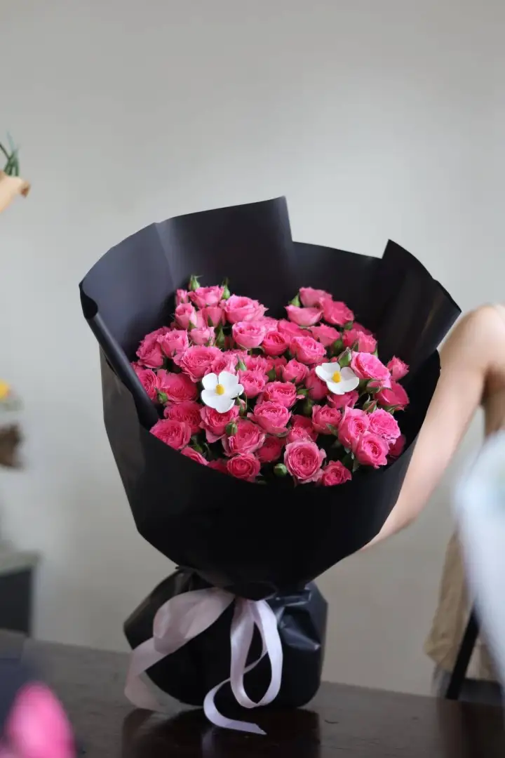 Hot Pink Spray Rose Bouquet on Black Wrap with White Bow