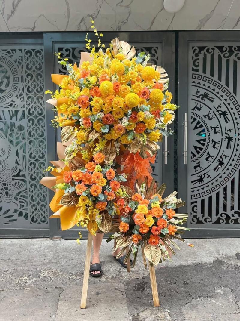 Kệ Hoa Khai Trương Vàng Cam Lá Nhũ Vàng