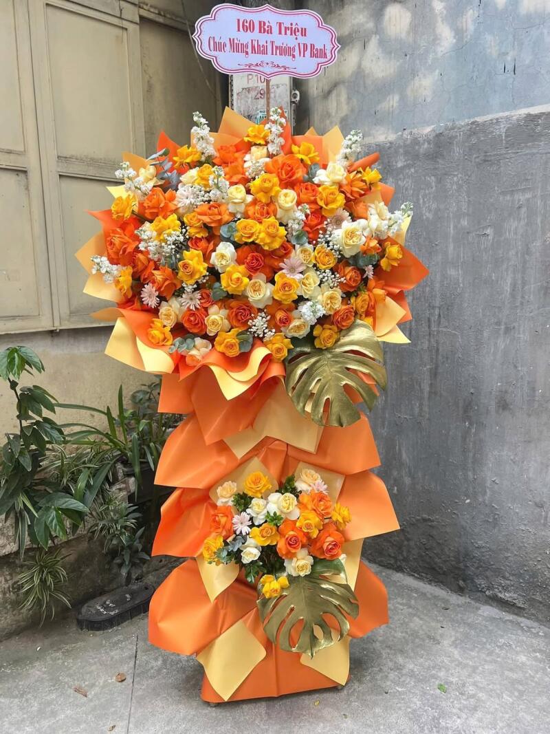 Kệ Hoa Khai Trương Cam Vàng Giấy Xếp Tầng